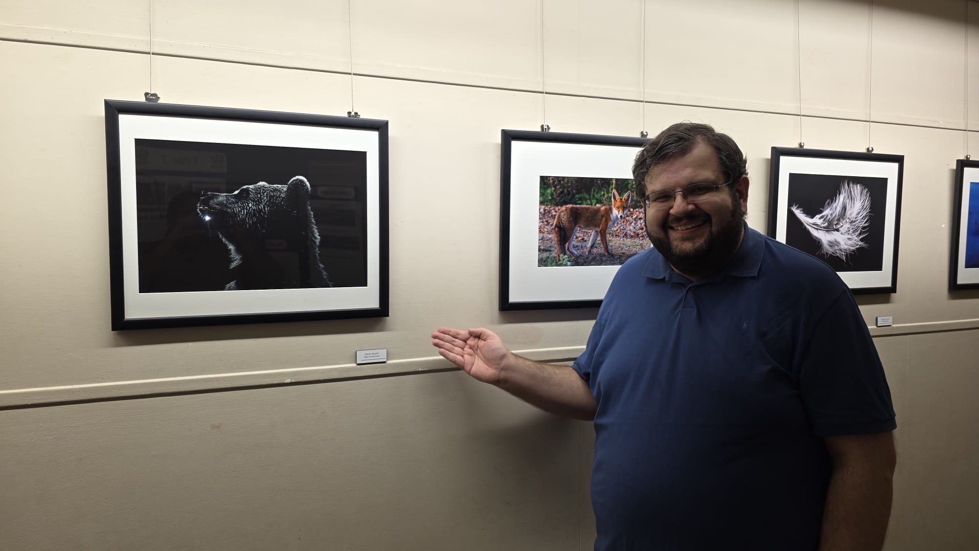 Alumnus Oliver Bryant with his award winner photograph 'Bearmusement'