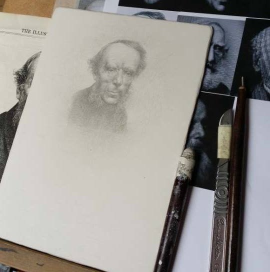 Roy's work in progress, with the silverpoint of Sidney Cooper on his easel, alongside reference photos and his drawing tools.