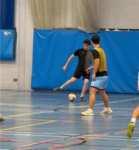 Homi playing Futsal