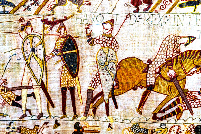 Embroidery of King Harold being killed by an arrow in the eye on the Bayeux Tapestry