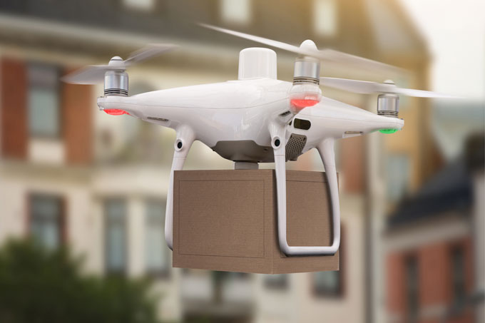 Drone flying with a parcel