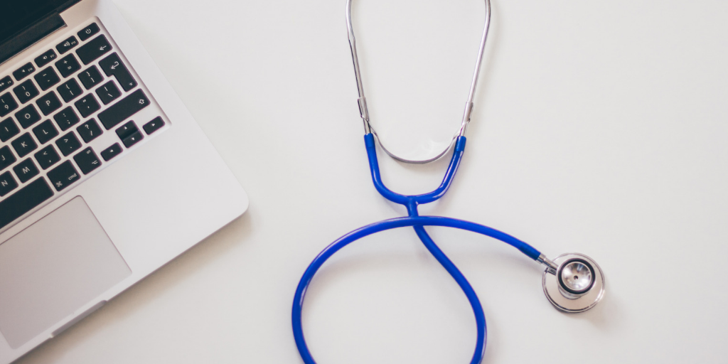 Image of stethoscope and laptop
