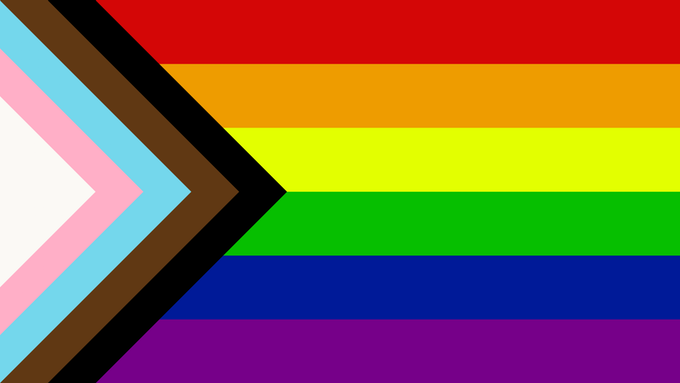 The LGBT flag, including black, brown, light blue, light pink and white stripes