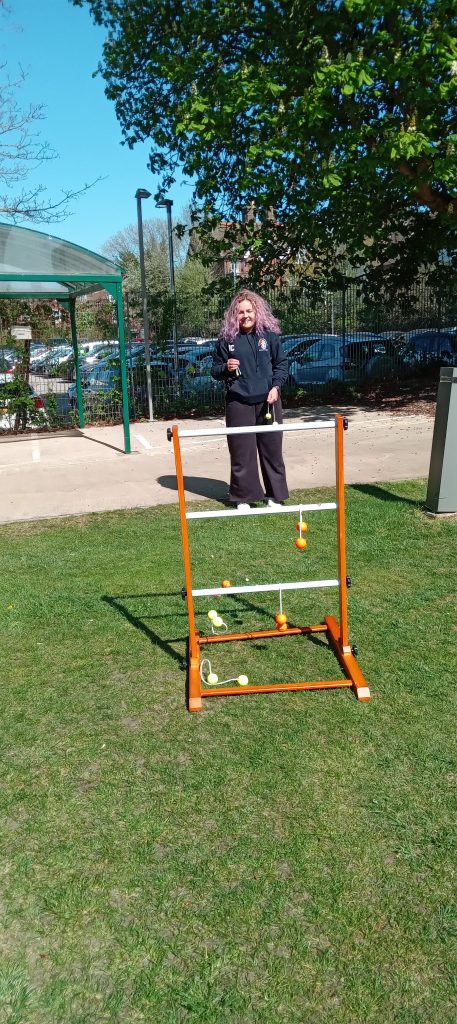 students playing ladder golf