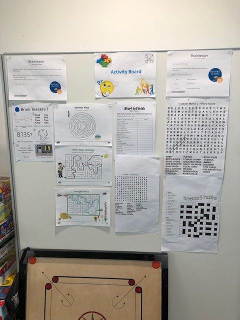 activity wall with many puzzles completed