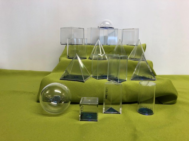 seventeen plastic geometric shapes with removal base allowing internal access