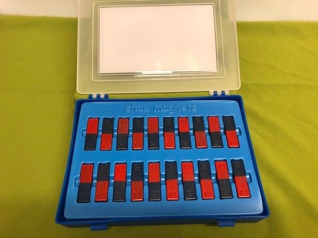 plastic box with flip lid containing twenty bar magnets