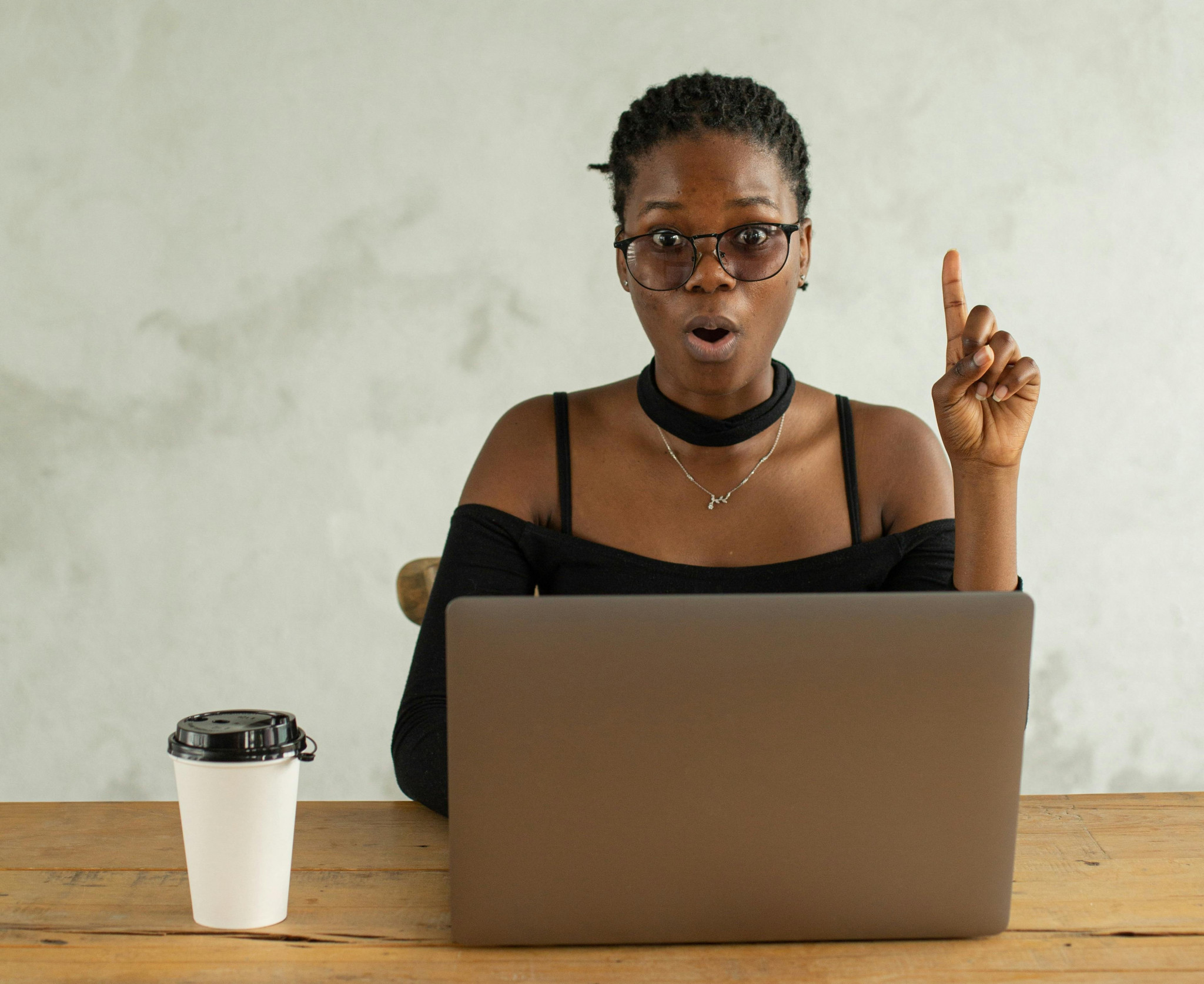 Surprised student by laptop