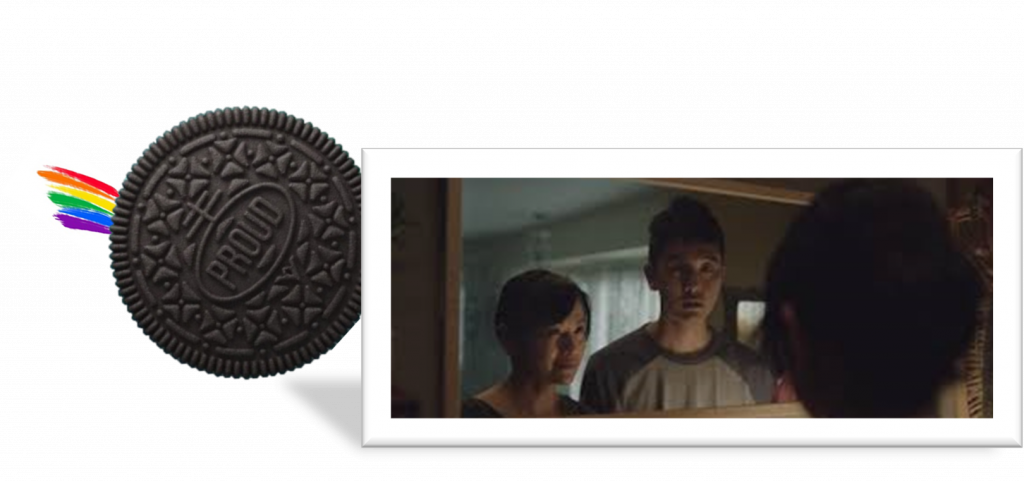 Picture of son and mother from short film The Note. Oreo cookie picture with proud written in the middle. 