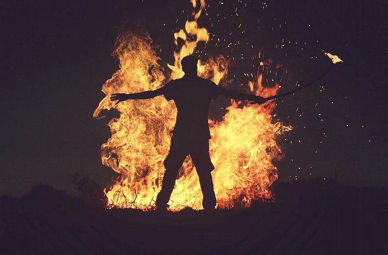Person Silhouette with fire