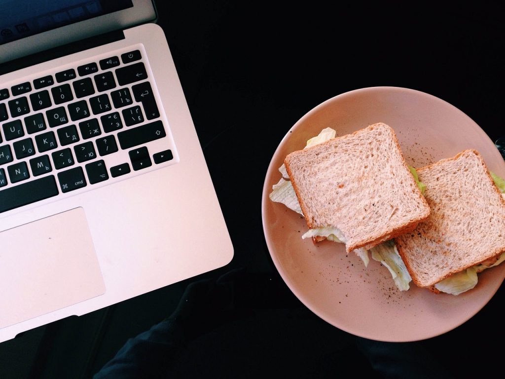 Sandwich and laptop. Image by StockSnap from Pixabay. 