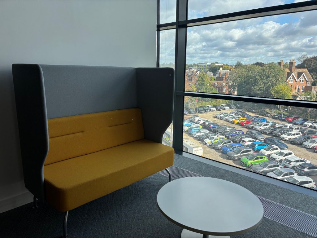 Yellow sofa in the Postgraduate study area, window view.