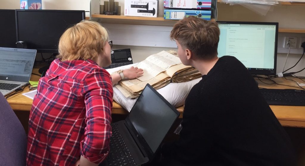 Students digitizing the Dover Wesleyan Methodist scrapbook
