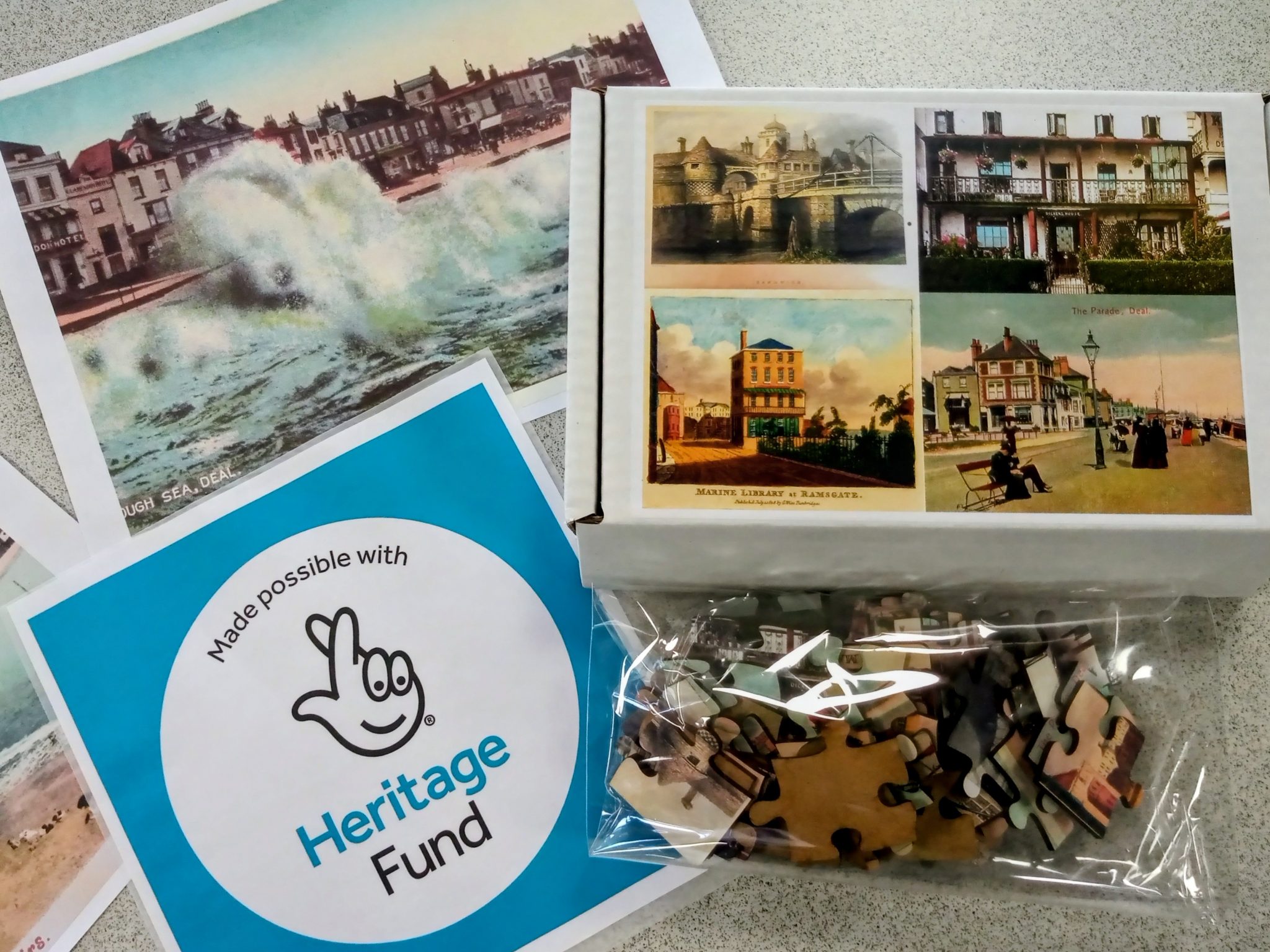 Old postcard images, a jigsaw and the National Lottery Heritage Fund logo