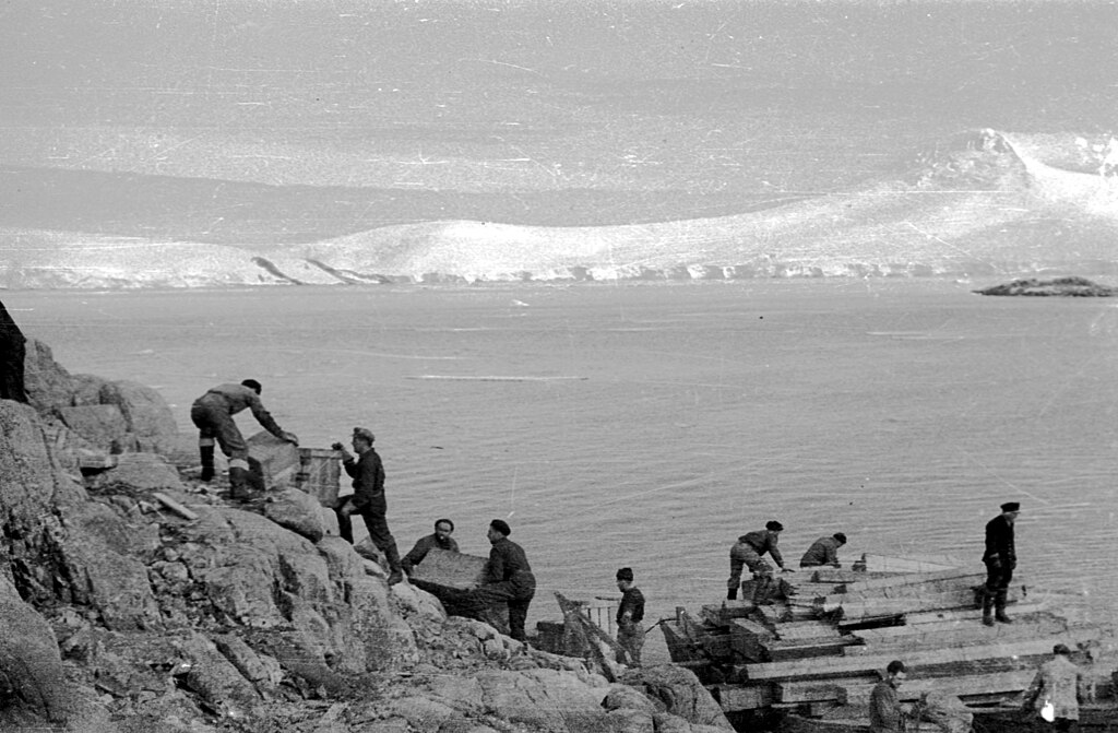 Personnel of Operation Tabarin unload supplies at Port Lockroy, Antarctica, 1944