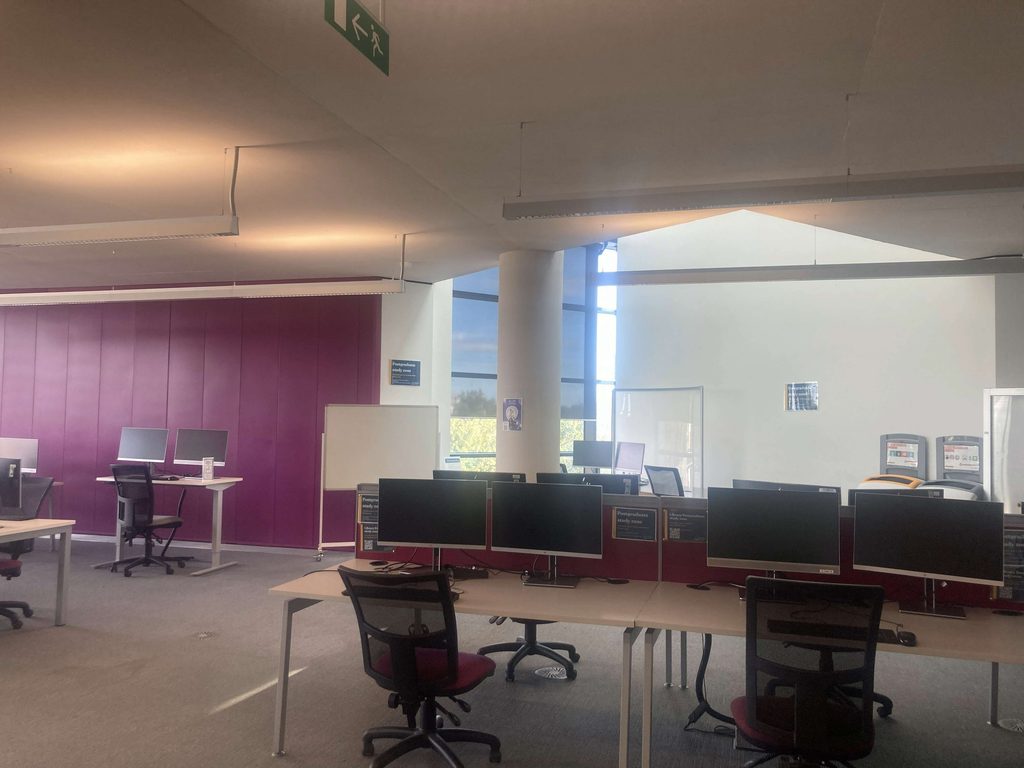 The middle of our Postgraduate Area. There are more dual screen monitors and in a brigher area.