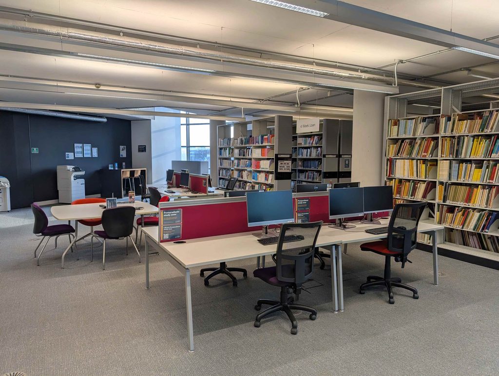 A wide-pan shot of our original Postgraduate Study Area.
