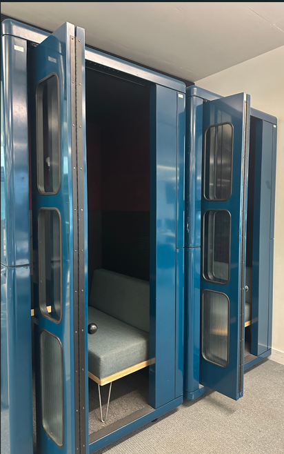 two small enclosed pods for studying.