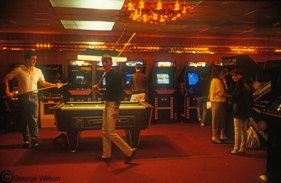 Arcade with pool table and slot machines